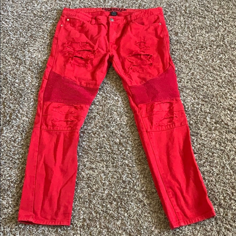 Encrypted brand red ripped jeans
